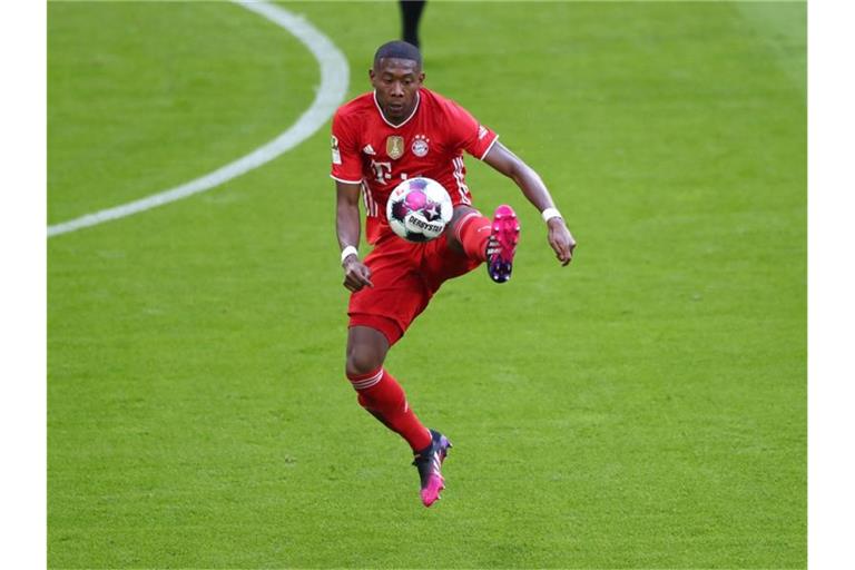 FC Bayern Münchens David Alaba am Ball. Foto: Matthias Schrader/AP-Pool/dpa