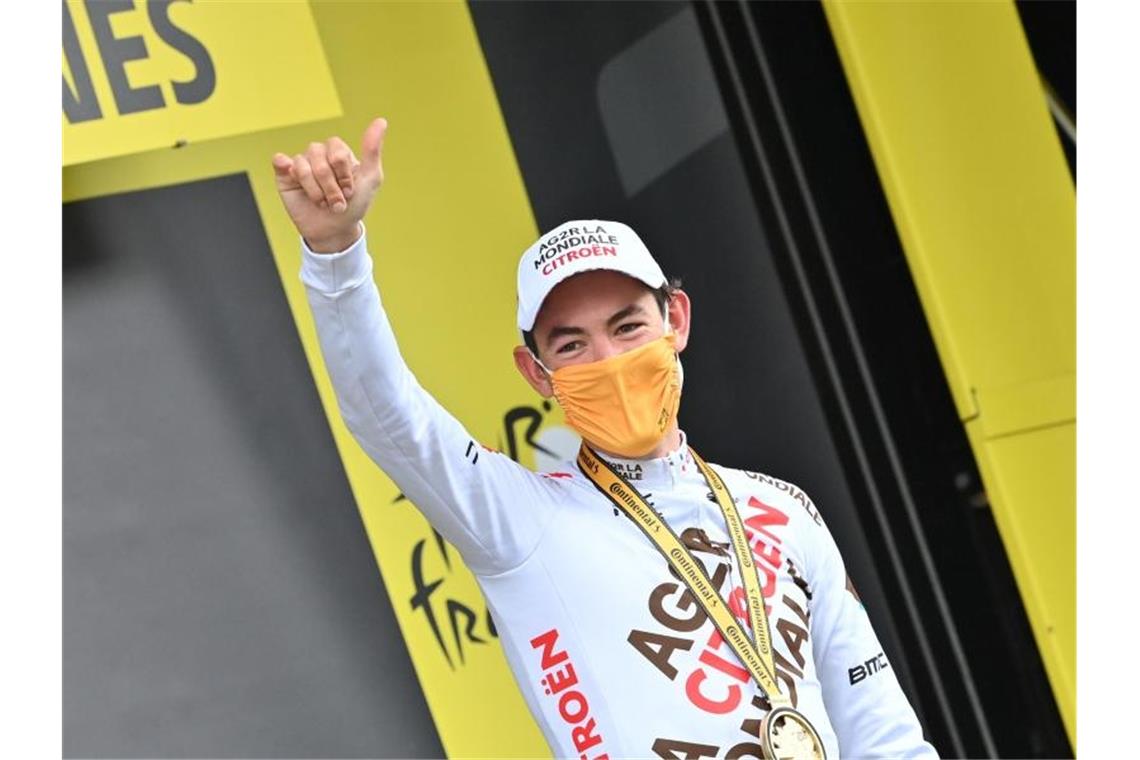 Tour-Dominator Pogacar unantastbar - Konkurrenten ratlos Feiert seinen ersten Toursieg: Ben O'Connor aus Australien. Foto: David Stockman/BELGA/dpa