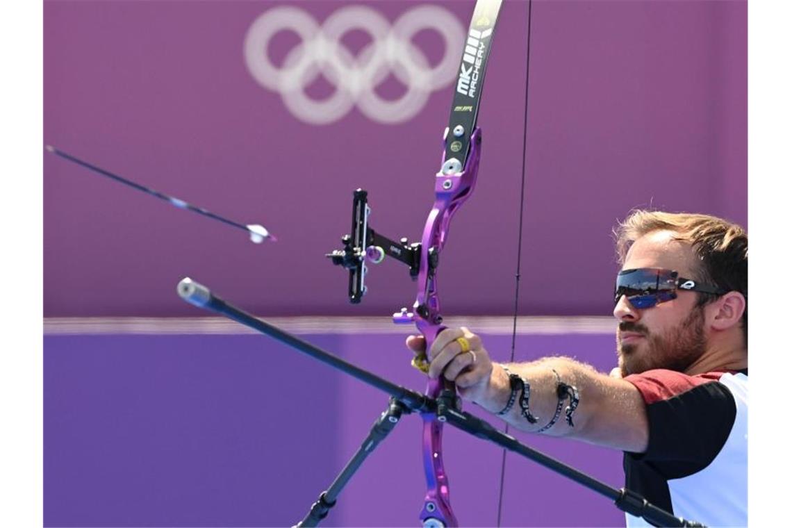 Das war die Olympia-Nacht Florian Unruh beim olympischen Bogenschießen. Foto: Marijan Murat/dpa