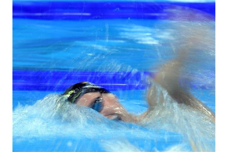 Florian Wellbrock holt Bronze über 1500 Meter Freistil. Foto: Swen Pförtner/dpa