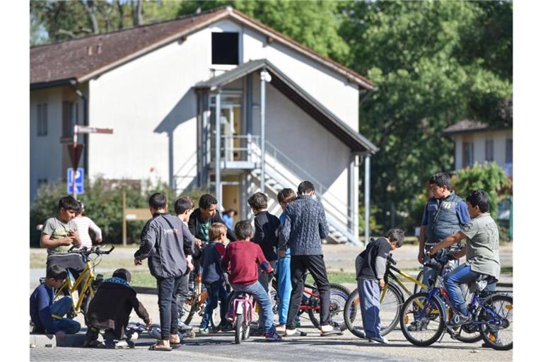 Flüchtlinge in Heidelberg. Foto: Uwe Anspach/Archivbild