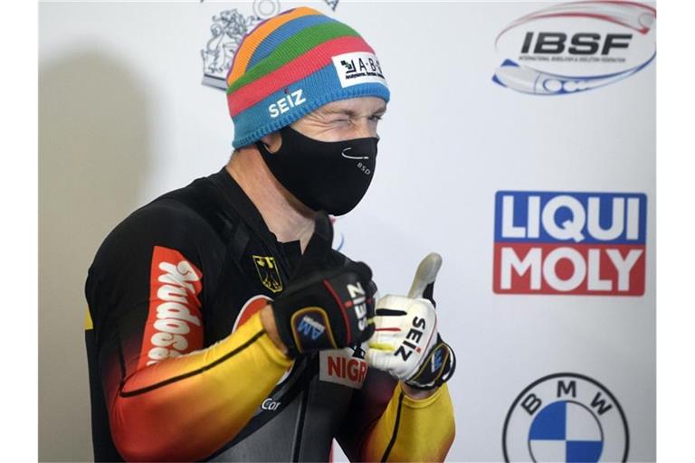 Francesco Friedrich will im Zweierbob in dieser Saison weiterhin ungeschlagen bleiben. Foto: Roman Koksarov/AP/dpa