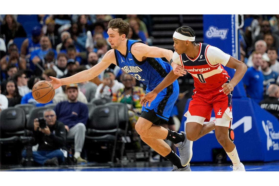 NBA: "Riesiger" Schröder baut Siegesserie mit Detroit aus Franz Wagner (l) glänzte erneut als Topscorer für die Orlando Magic.