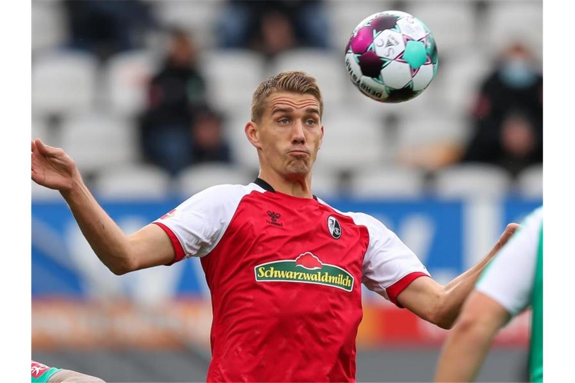 Corona-Test uneindeutig: SC Freiburg gegen FCA ohne Petersen Freiburgs Nils Petersen in Aktion. Foto: Tom Weller/dpa/Archivbild