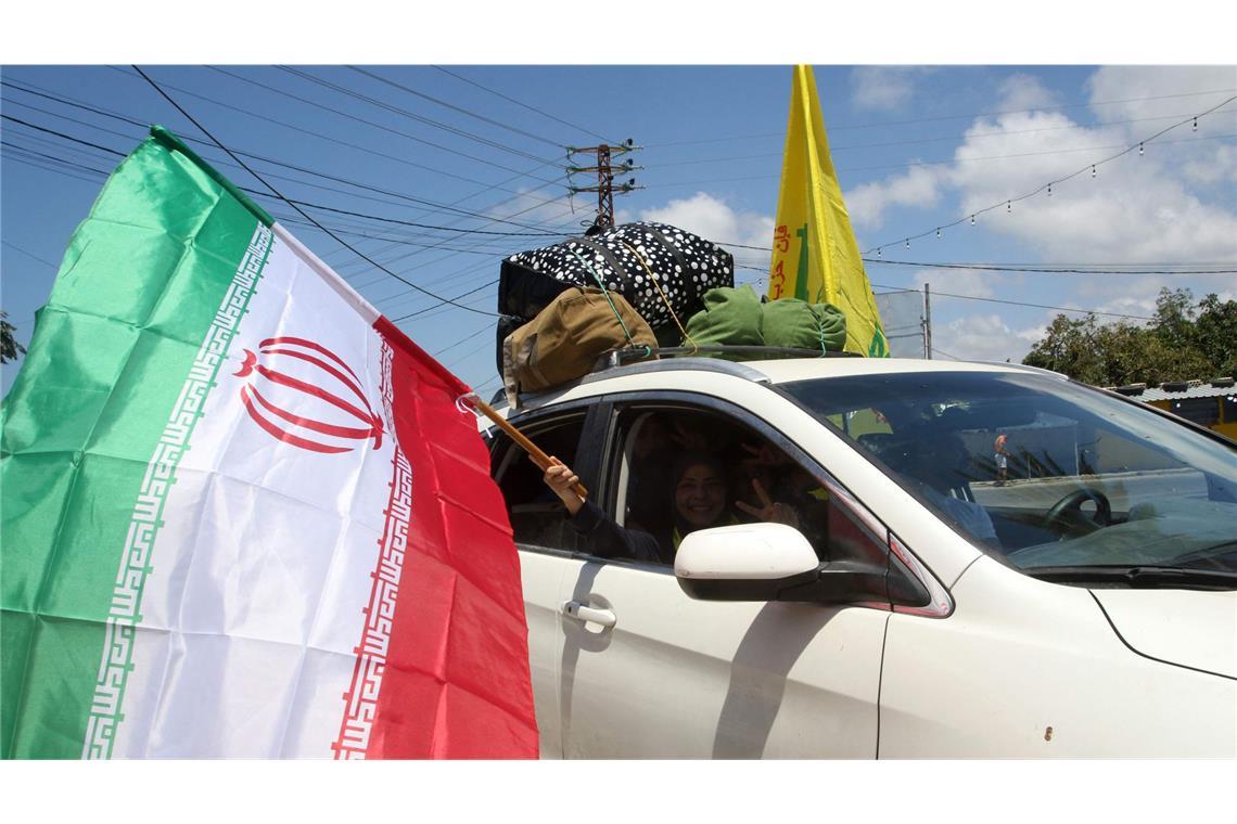 Für Anhänger des iranischen Regimes ist der Ausgang des Krieges ein Erfolg.