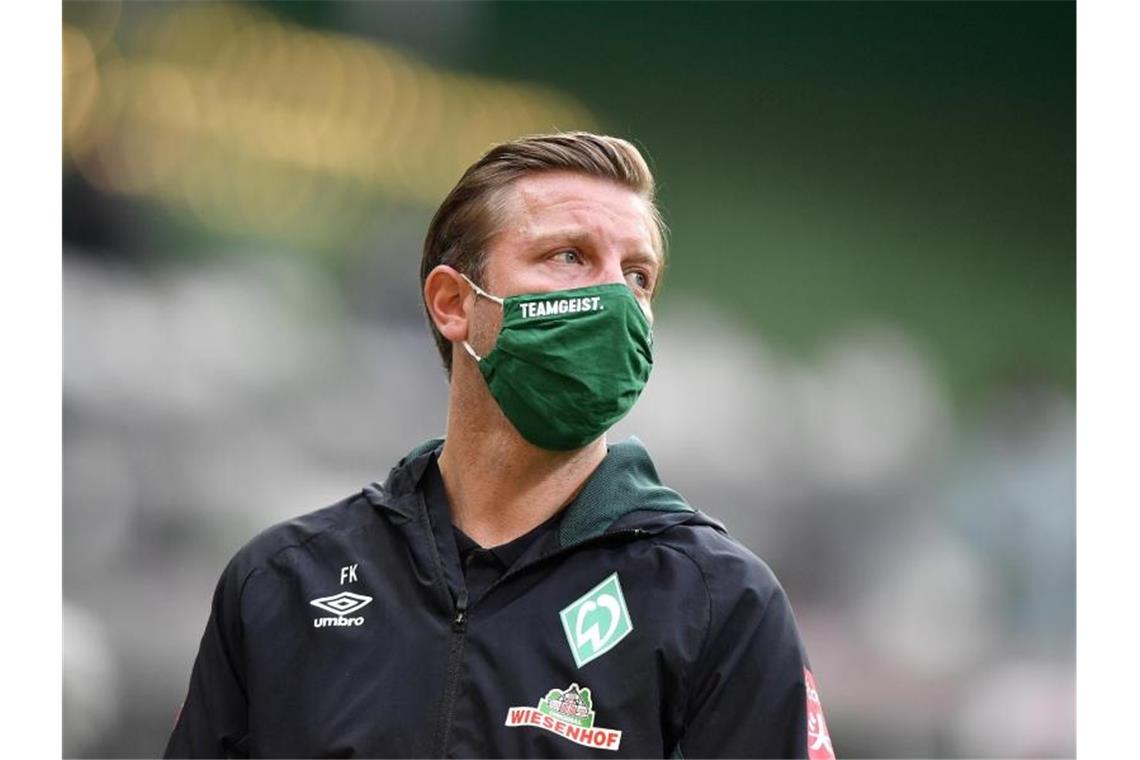 Für Trainer Florian Kohfeldt und Werder Bremen geht es beim Abstiegsduell in Mainz um „alles“. Foto: Martin Meissner/AP-Pool/dpa