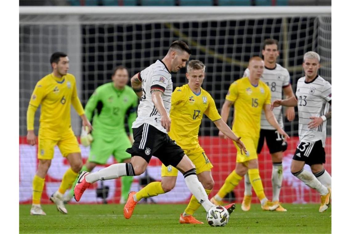 Löw-Elf dank Werner auf Kurs: Sieg gegen die Ukraine Fungierte als Abwehrchef: Niklas Süle (M.). Foto: Robert Michael/dpa-Zentralbild/dpa