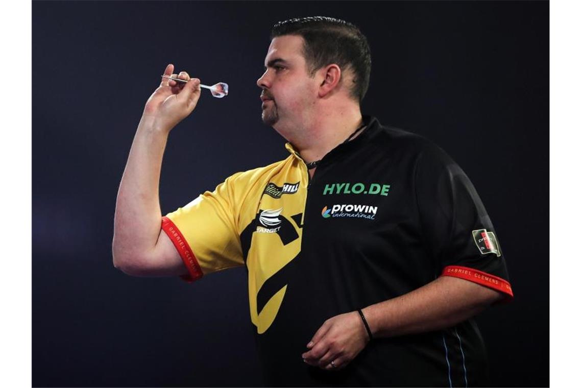 Große Chance verpasst: Clemens bei Darts-WM ausgeschieden Gabriel Clemens im Alexandra Palace in Aktion. Foto: Kieran Cleeves/PA Wire/dpa