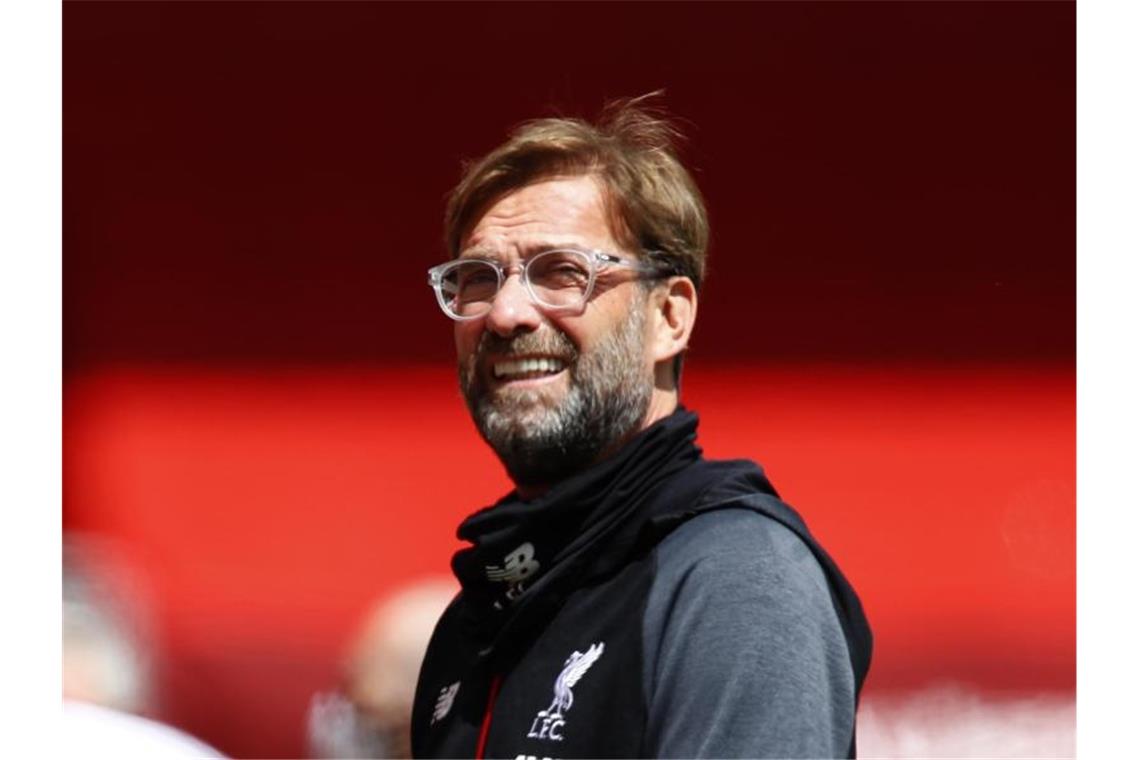 Geht entspannt mit dem vom FC Liverpool verpassten Punkterekord in der Premier League um: Trainer Jürgen Klopp. Foto: Cath Ivill/Pool Reuters/AP/dpa