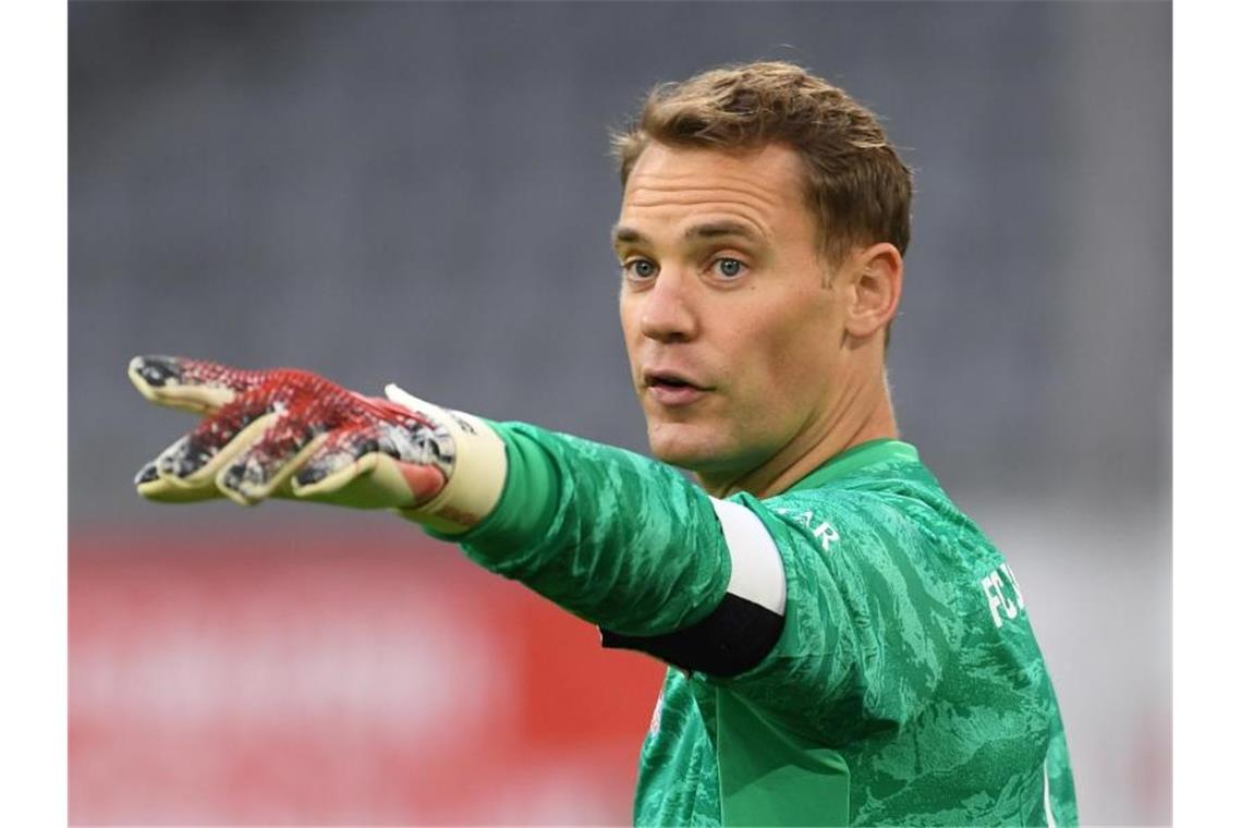 Kapitäne der Bundesliga: Die „Alten“ haben das Sagen Geht in seine vierte Saison als Bayern-Kapitän Manuel Neuer. Foto: Andreas Gebert/Reuters-Pool/dpa