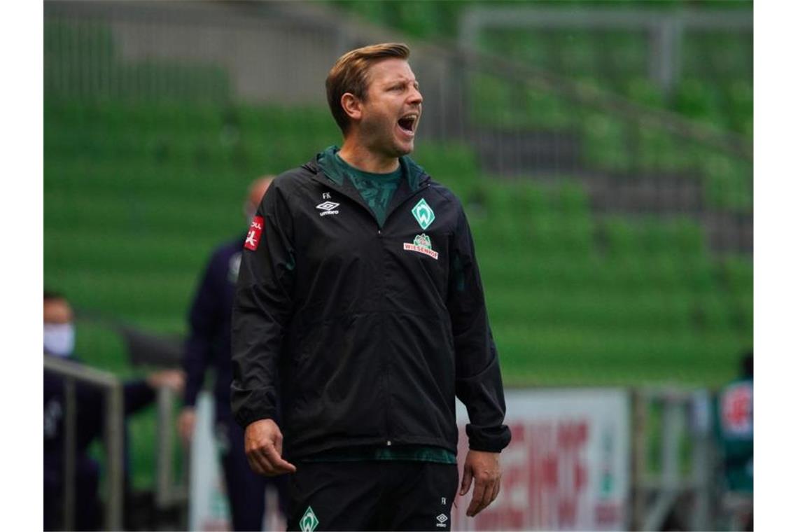 Geht mit Bremen als Favorit in die Relegation gegen den FC Heidenheim: Werder-Coach Florian Kohfeldt. Foto: Patrik Stollarz/AFP/Pool/dpa