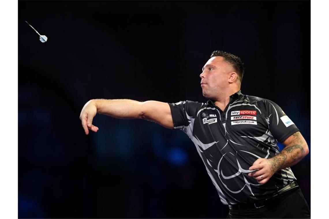 Wer siegt im Corona-Chaos? Darts-WM geht in die heiße Phase Gerwyn Price ist bei der Darts-WM der Gejagte. Foto: Zac Goodwin/PA Wire/dpa