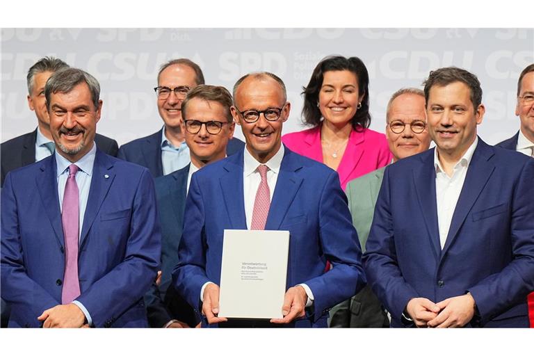 Geschafftes Strahlen: der neue Koalitionsvertrag