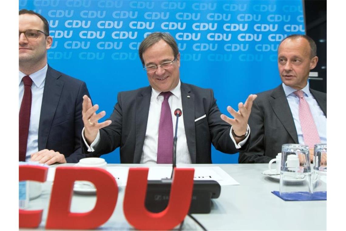 Künftiger CDU-Chef soll sich erneut zur Wahl stellen Gesundheitsminister Jens Spahn (l-r), NRW-Ministerpräsident Armin Laschet und Friedrich Merz. Foto: Federico Gambarini/dpa