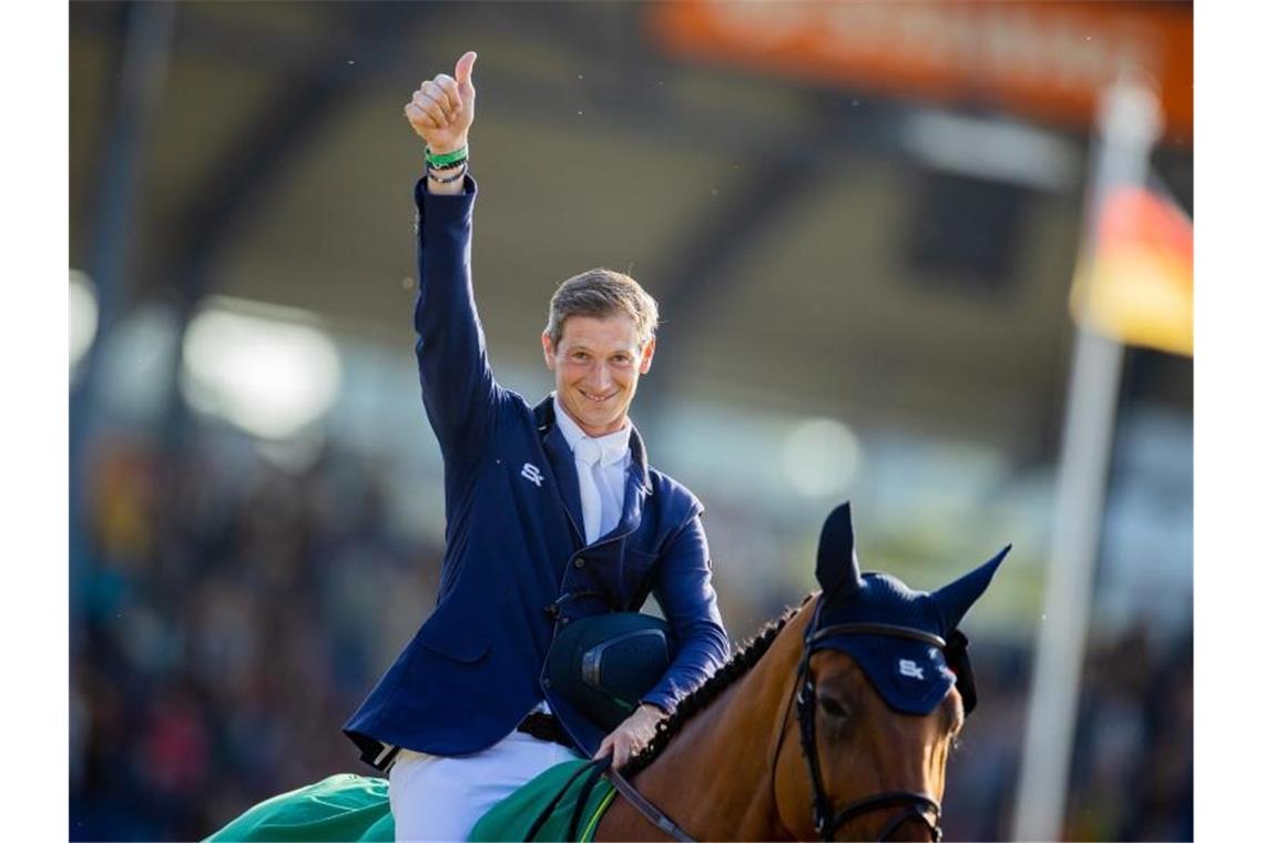 Gewann beim CHIO in Aachen: Daniel Deußer auf seinem Pferd Killer Queen. Foto: Rolf Vennenbernd/dpa