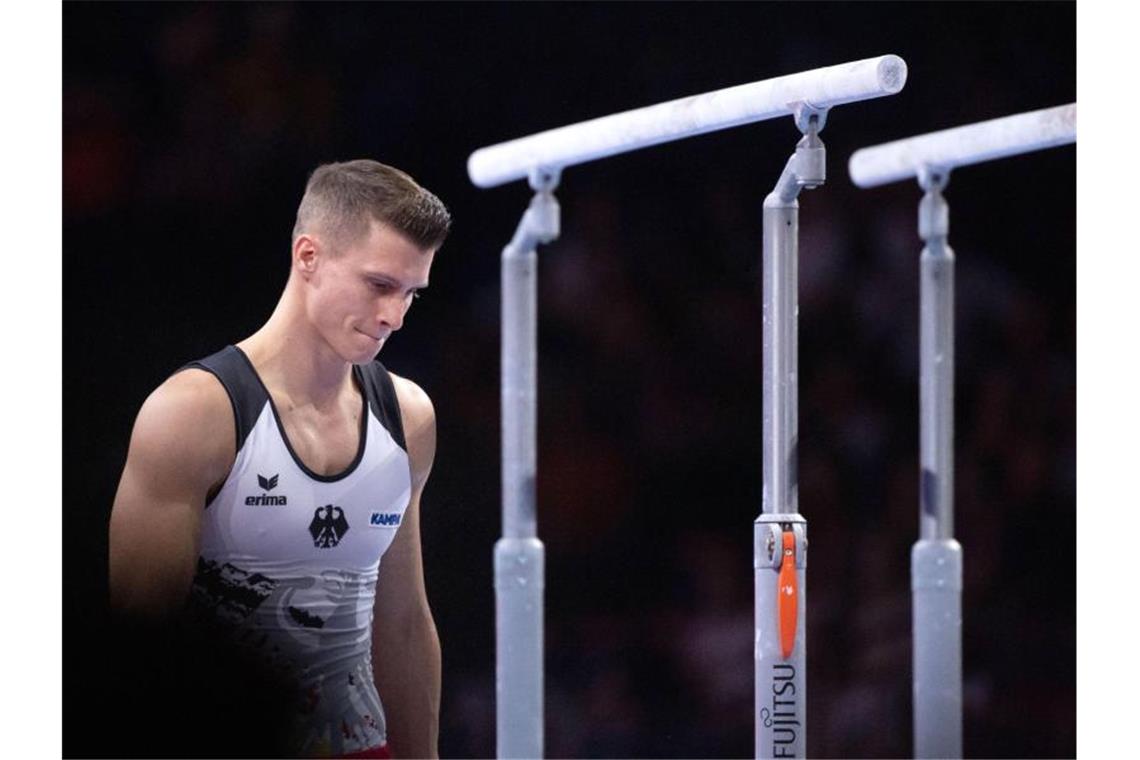 Biles-Spiele bei toller Turn-WM - DTB mit Bilanz zufrieden Ging hohes Risiko und musste nach einem Fehler absteigen: Lukas Dauser am Barren. Foto: Marijan Murat/dpa