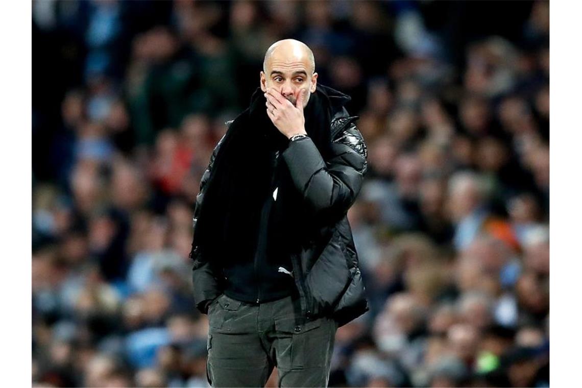 Man-City-Coach Guardiola glaubt nicht mehr an den Titel Glaubt nicht mehr an den Meister-Titel: Manchester Citys Coach Pep Guardiola. Foto: Martin Rickett/PA Wire/dpa