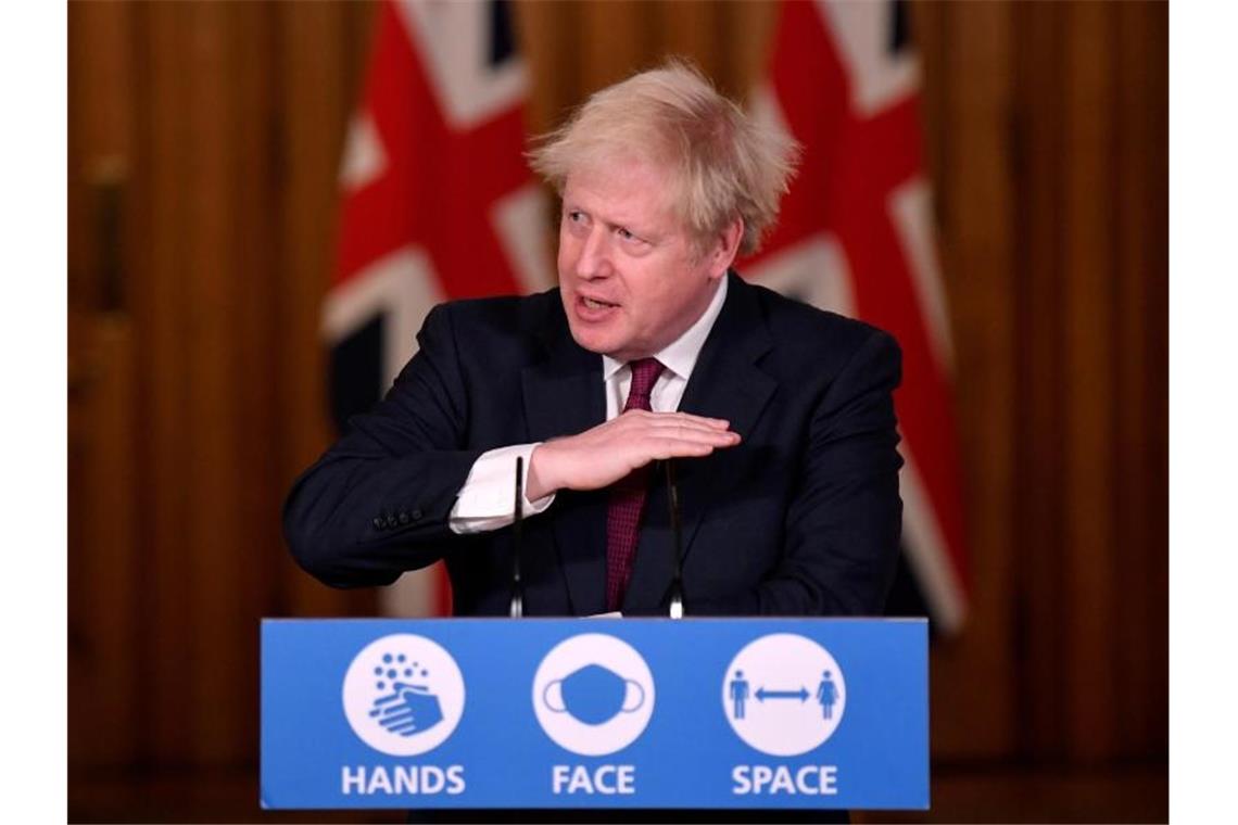 Virus-Variante: EU schottet sich gegen Großbritannien ab Großbritanniens Premier verkündet strenge Ausgangsbeschränkungen während der Weihnachtstage. Foto: Toby Melville/PA Wire/dpa