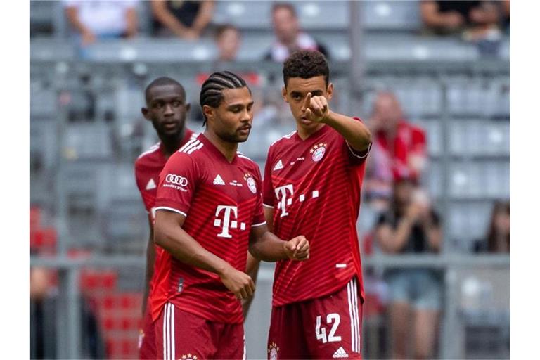 Haben wieder beim FC Bayern mittrainiert: Serge Gnabry (l) und Jamal Musiala. Foto: Sven Hoppe/dpa