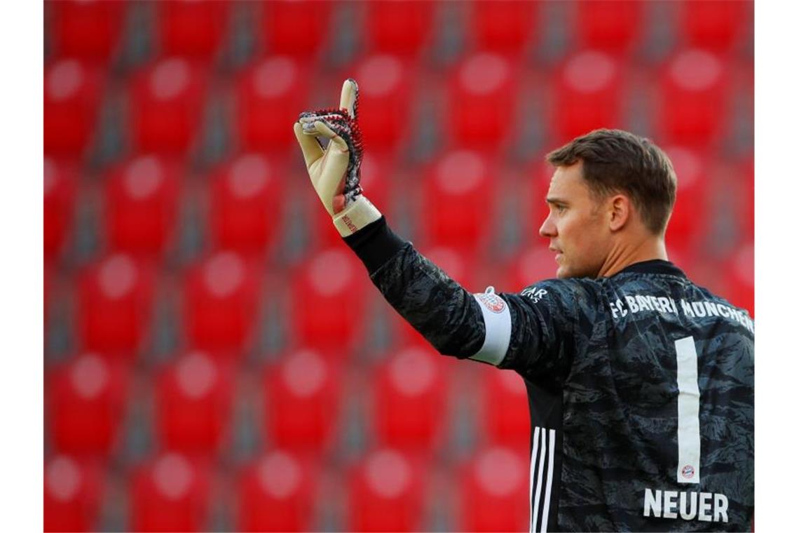 Hat seinen Vertrag beim FC Bayern verlängert: Kapitän Manuel Neuer. Foto: Hannibal Hanschke/Reuters-Pool/dpa