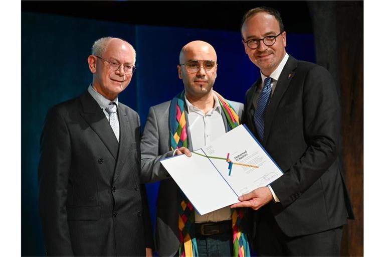 Herman Van Rompuy (l-r), Ex-Premierminister von Belgien, Mohamed El Bachiri und Uli Burchardt. Foto: Felix Kästle/dpa