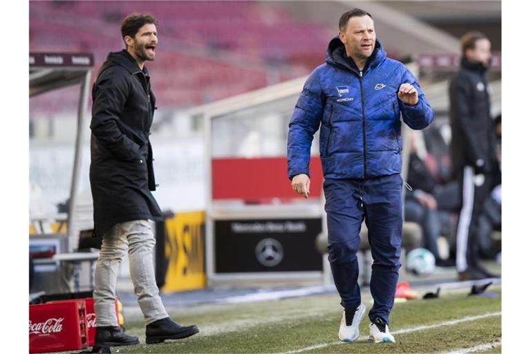 Hertha BSC setzt weiter auf Trainer Pal Dardai (r), Sportdirektor Arne Friedrich soll auch bleiben. Foto: Tom Weller/dpa