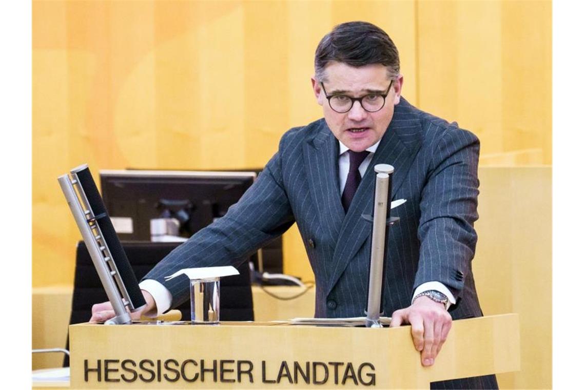 Gedenken an Hanau-Opfer im Landtag Hessens Landtagspräsident Boris Rhein: „Wir werden das Andenken an Ihre Kinder, Eltern, Geschwister immer wahren.“. Foto: Andreas Arnold/dpa