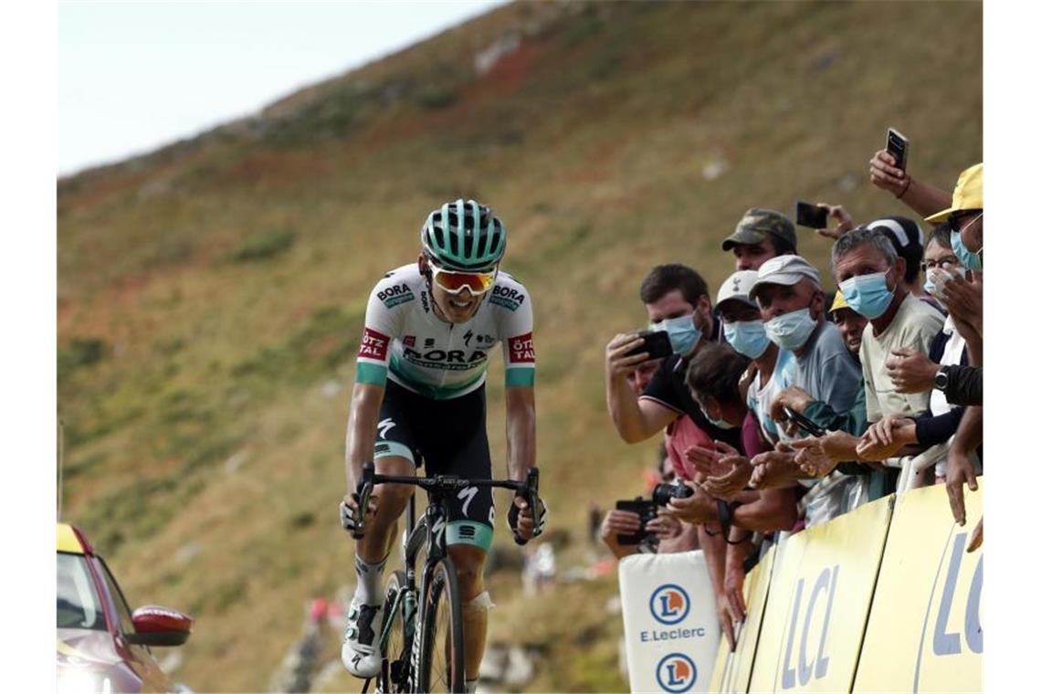 Endlich am Ziel: Kämna gewinnt 16. Tour-Etappe Holte den ersten deutschen Etappensieg der 107. Tour de France: Lennard Kämna. Foto: Benoit Tessier/Reuters/AP/dpa