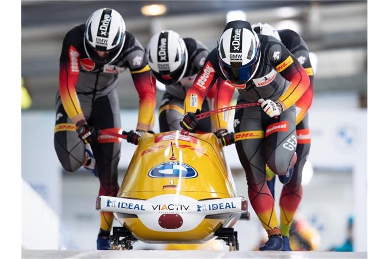 Holten WM-Gold in Altenberg: Francesco Friedrich, Thorsten Margis, Candy Bauer und Alexander Schüller aus Deutschland. Foto: Sebastian Kahnert/dpa-Zentralbild/dpa