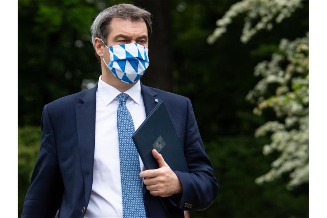 Corona-Massentests: Streit über den „bayerischen Weg“ „Ich glaube schon, dass das eine Wirkung hat weit über Bayern hinaus“, sagt Markus Söder. Foto: Sven Hoppe/dpa