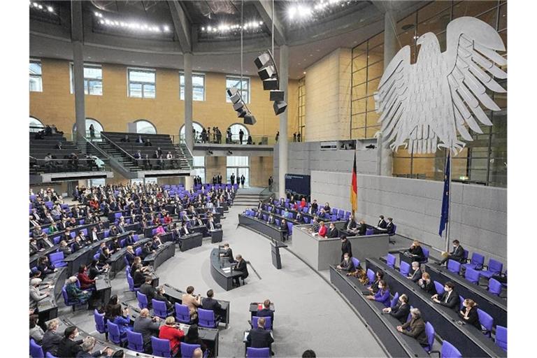 Im Bundestag fand die Vereidigung von Scholz zum Bundeskanzler und die Vereidigung der Bundesministerinnen und -minister der neuen rot-grün-gelben Bundesregierung statt. Foto: Michael Kappeler/dpa