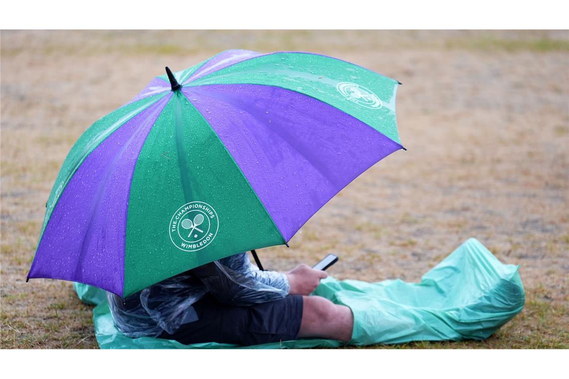 Bilder des Tages Im Regen auf dem Rasen - Wimbledon bislang durchwachsen