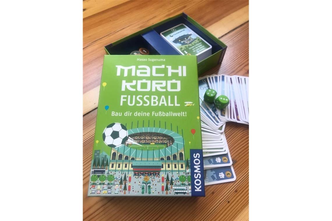 Tore, Tie-Breaks, Touchdowns: Elf Spieletipps für Sport-Fans Imbiss, Kassenhäuschen und Co. geben je nach Würfelglück bei Machi Koro Fußball Einkommen. Foto: David Kluthe/dpa