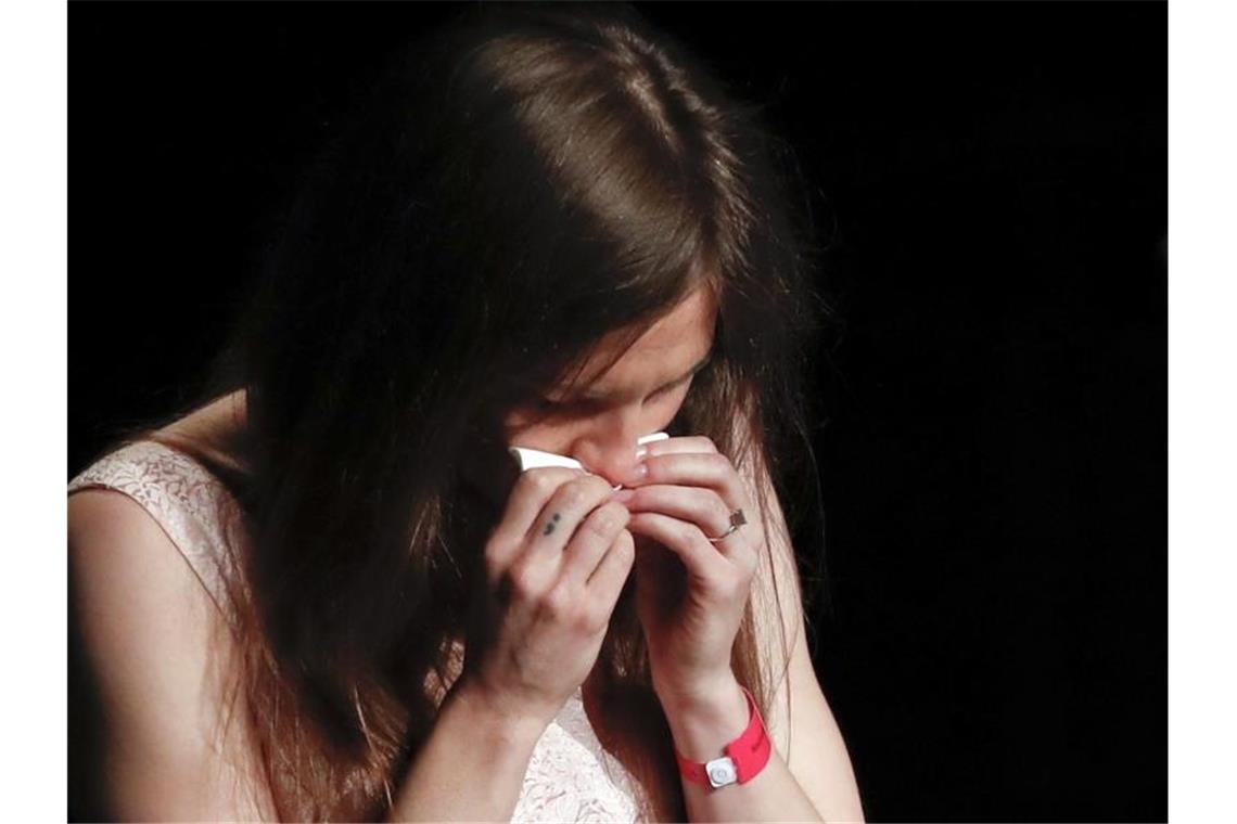 Immer wieder kämpft Amanda Knox bei dem Kongress zu Justizirrtümern mit den Tränen. Foto: Antonio Calanni/AP