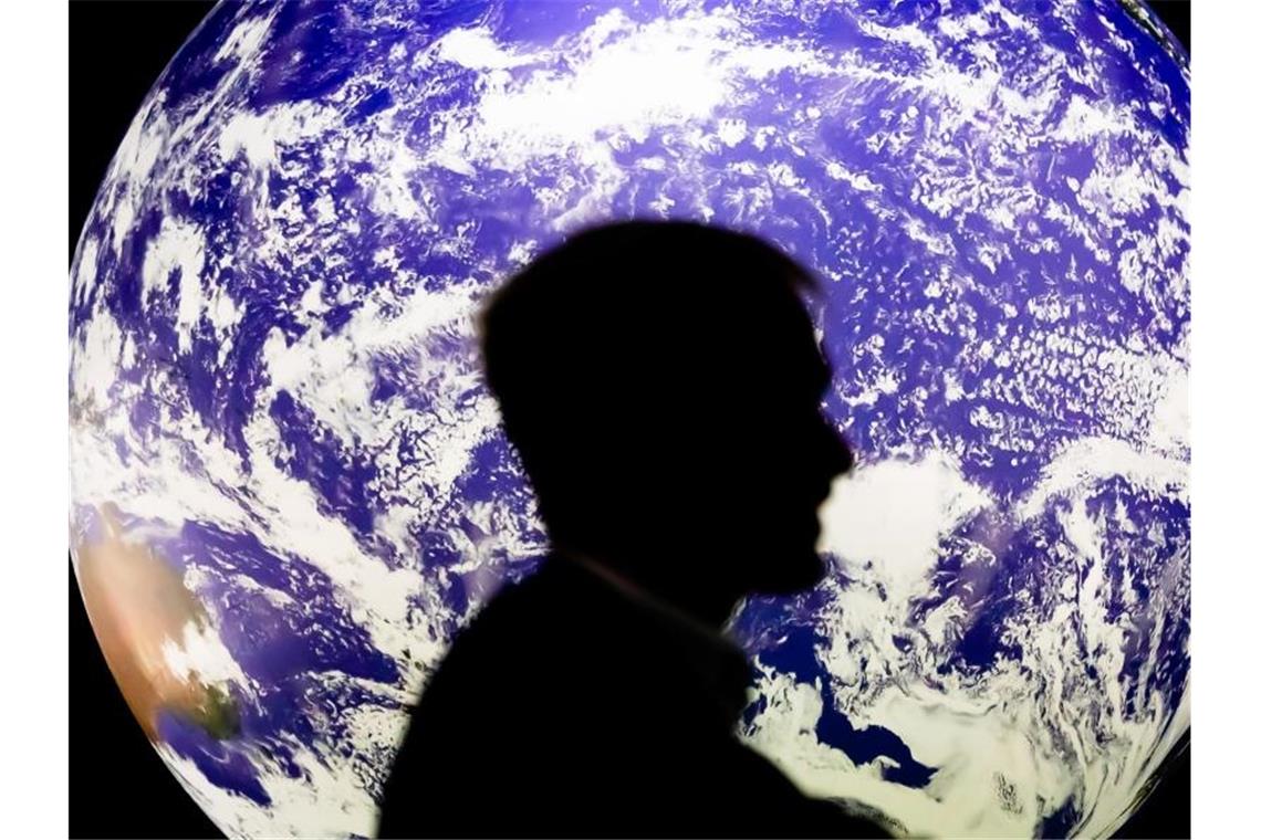 UN-Klimakonferenz: Entwurf für Abschlusserklärung erwartet In Glasgow ringen rund 200 Staaten darum, wie das Ziel, die Erderwärmung möglichst auf 1,5 Grad im Vergleich zur vorindustriellen Zeit zu begrenzen, noch erreicht werden kann. Foto: Christoph Soeder/dpa
