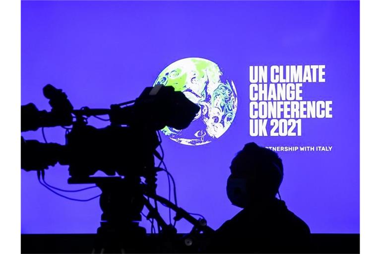 In Glasgow verhandeln rund 200 Staaten darüber, wie die globale Klimakrise und die Erderwärmung eingedämmt werden sollen. Foto: Christoph Soeder/dpa
