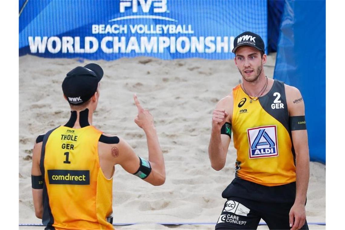 Viertelfinale: Nächste Stars warten auf Thole/Wickler In Hamburg weiter in der Erfolgsspur: Julius Thole (l) und Clemens Wickler. Foto: Christian Charisius