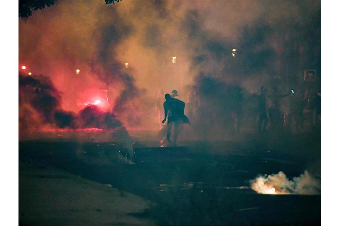 In Paris kam es zu Ausschreitungen. Foto: Alain Jocard/AFP/dpa