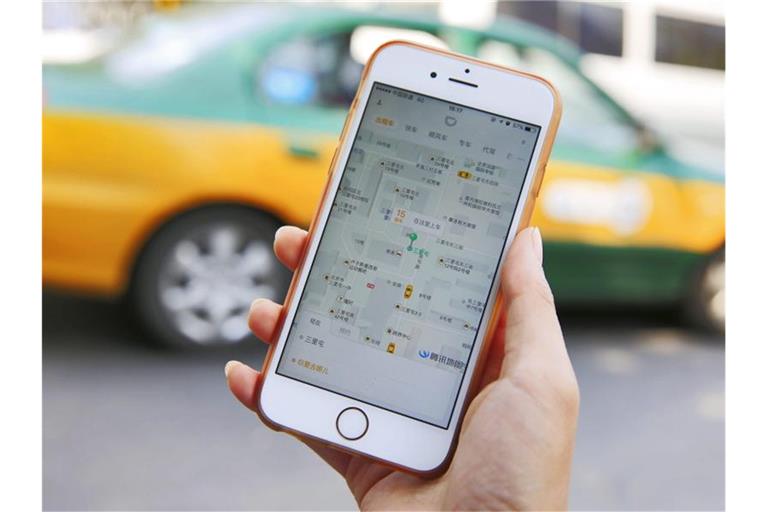 In seinem Heimatmarkt Cina setzte sich Didi in einem erbitterten Preiskampf gegen Uber durch. Foto: How Hwee Young/EPA/dpa