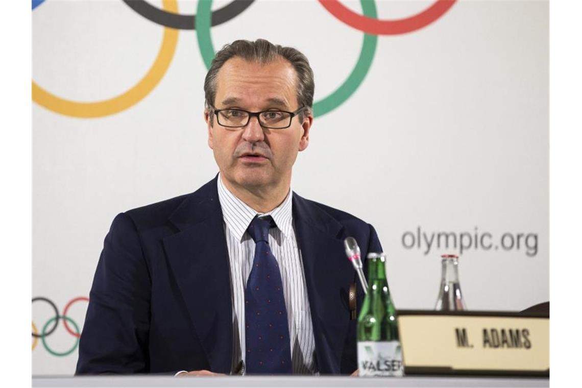 IOC-Sprecher Mark Adams spricht auf einer Pressekonferenz. Foto: Cyril Zingaro/KEYSTONE/dpa/Archivbild