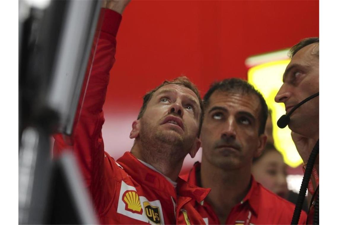Ist am Sonntag in Suzuka gleich zweimal gefordert: Ferrari-Pilot Sebastian Vettel. Foto: Toru Takahashi/AP/dpa