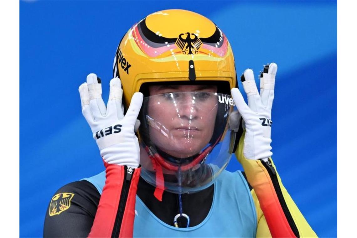 Ist mit ihrer sechsten Goldmedaille bei Winterspielen deutsche Rekord-Olympiasiegerin: Natalie Geisenberger. Foto: Robert Michael/dpa-Zentralbild/dpa
