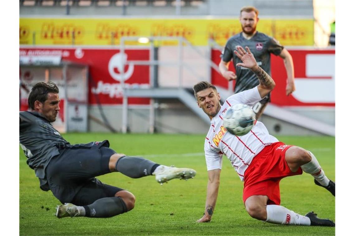 Jahn Regensburg und der 1. FC Nürnberg teilten sich die Punkte. Foto: Daniel Karmann/dpa-Pool/dpa