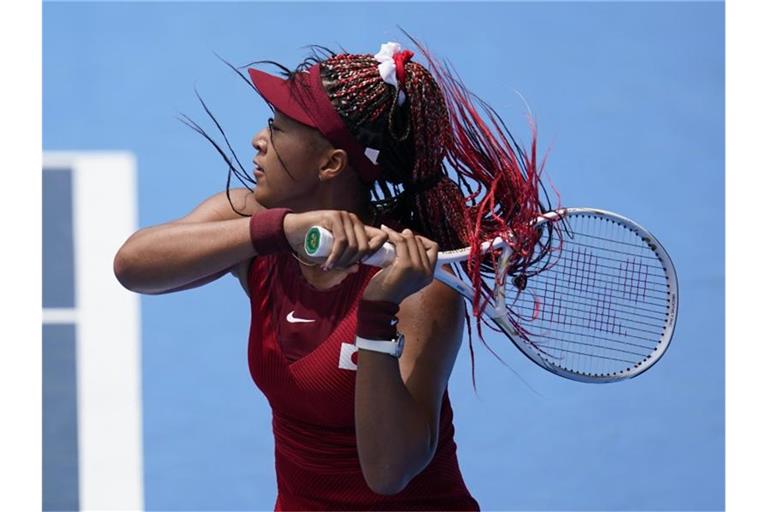 Japans Tennis-Idol Naomi Osaka ist beim olympischen Turnier in Tokio ausgeschieden. Foto: Patrick Semansky/AP/dpa