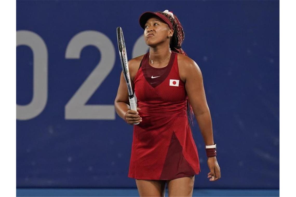 Japans Tennis-Idol Naomi Osaka ist beim olympischen Turnier in Tokio ausgeschieden. Foto: Seth Wenig/AP/dpa