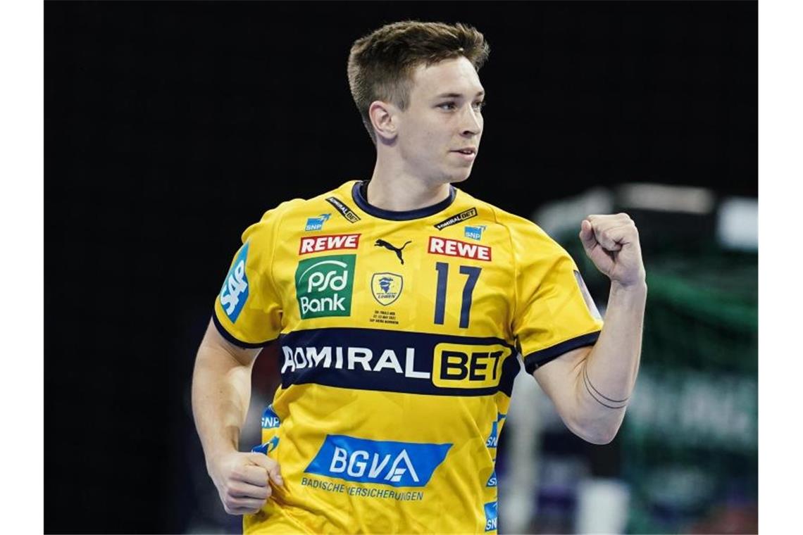 Platz drei für Handball-Löwen in der European League Jerry Tollbring von den Rhein-Neckar Löwen jubelt über ein Tor. Foto: Uwe Anspach/dpa