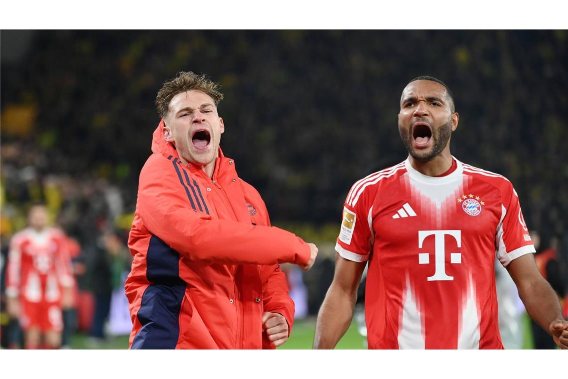 Joshua Kimmich und Jonathan Tah jubeln nach dem Sieg.