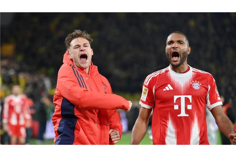 Joshua Kimmich und Jonathan Tah jubeln nach dem Sieg.