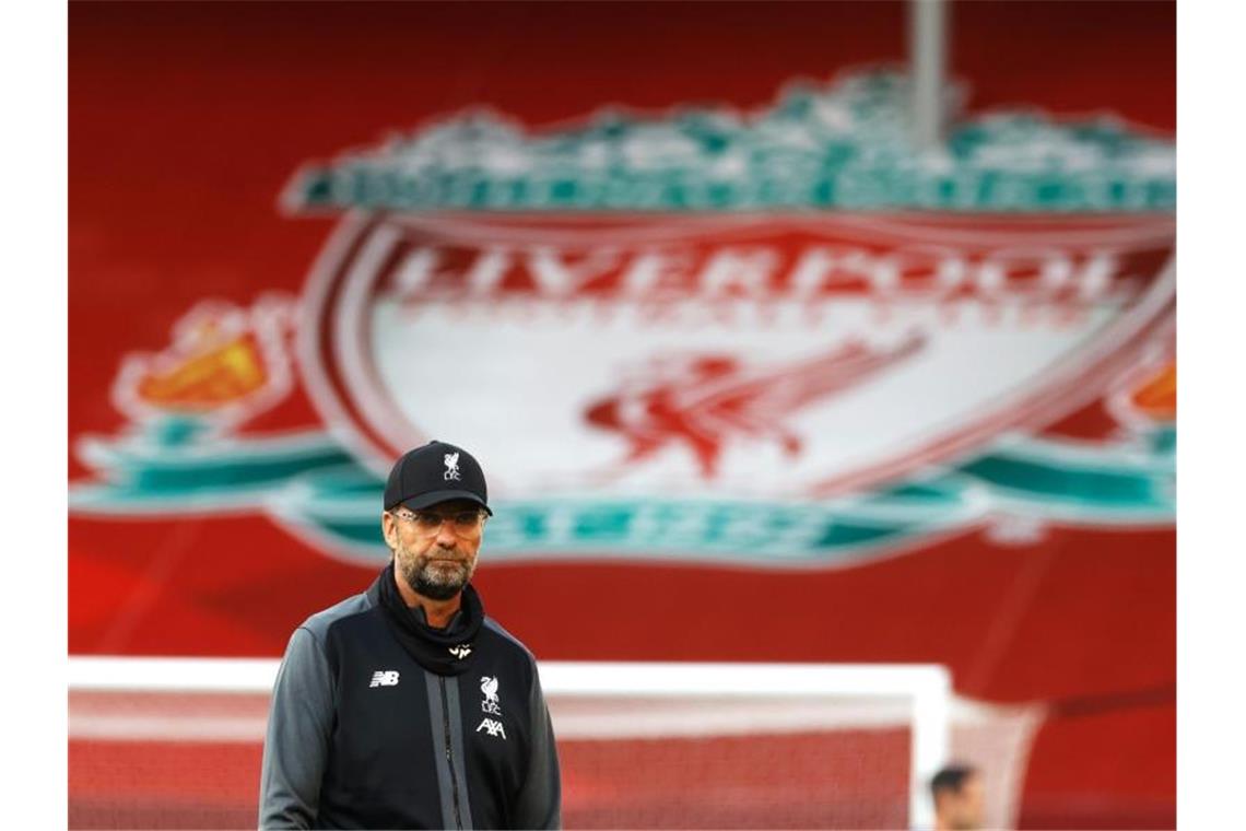 Jürgen Klopp kann mit dem FC Liverpool vor dem Fernseher Meister werden. Foto: Phil Noble/Nmc Pool/PA Wire/dpa