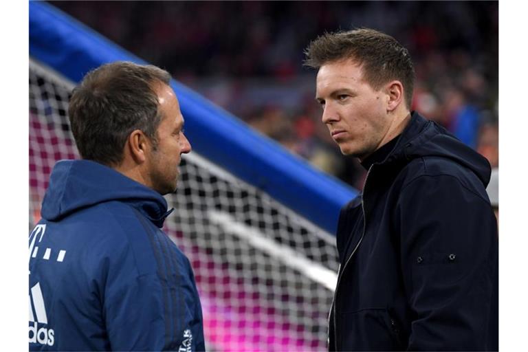 Julian Nagelsmann (r) folgte Hansi Flick beim FC Bayern München als Trainer. Foto: Matthias Balk/dpa
